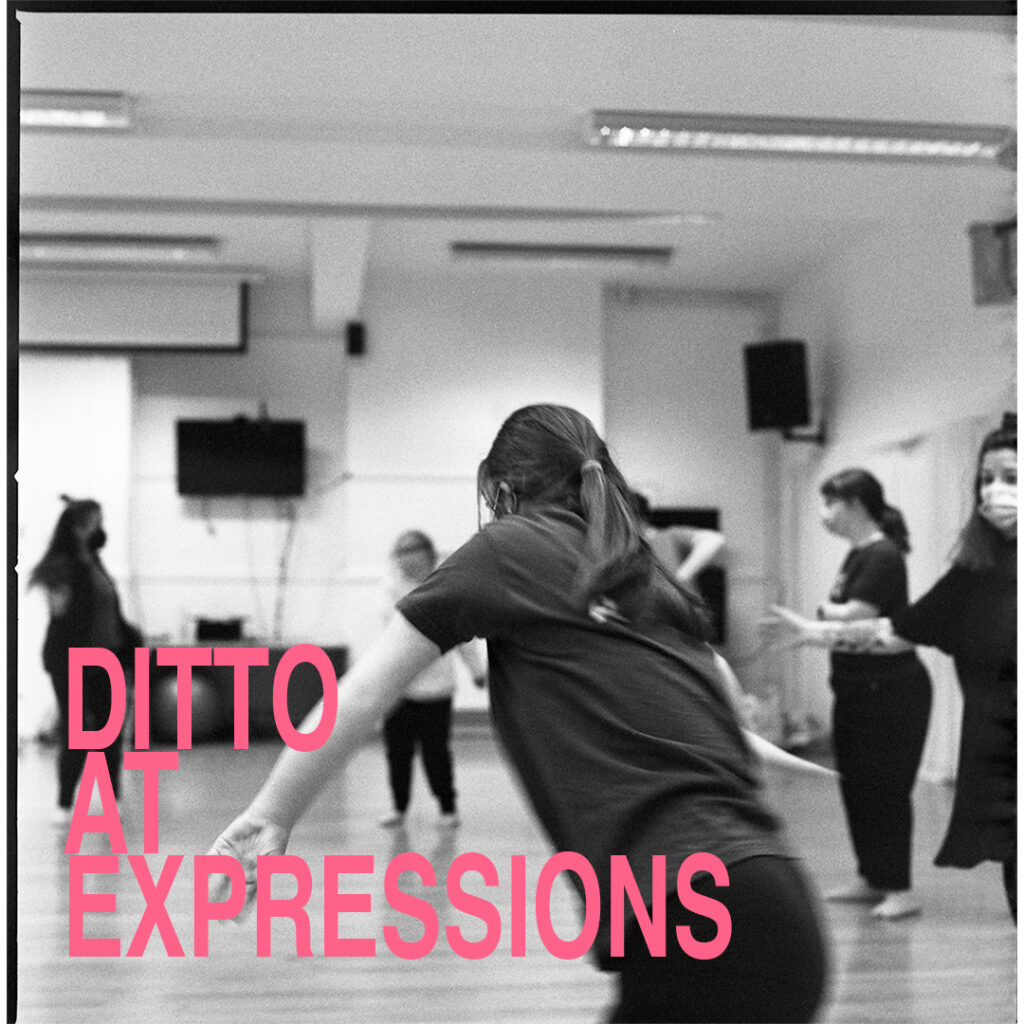 Dancers caught in motion, rehearsing in their studio. Overlaying the black and white image, in the bottom left hand corner, pink text reads DITTO AT THE EXPRESSIONS.